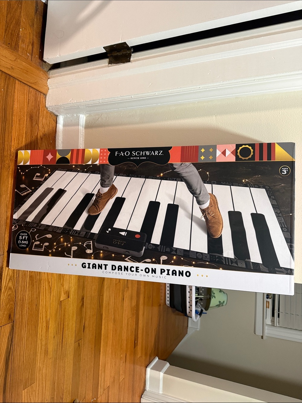 FAO Schwarz Black & White Giant Dance-On Piano Mat with Colorful Accent Border
